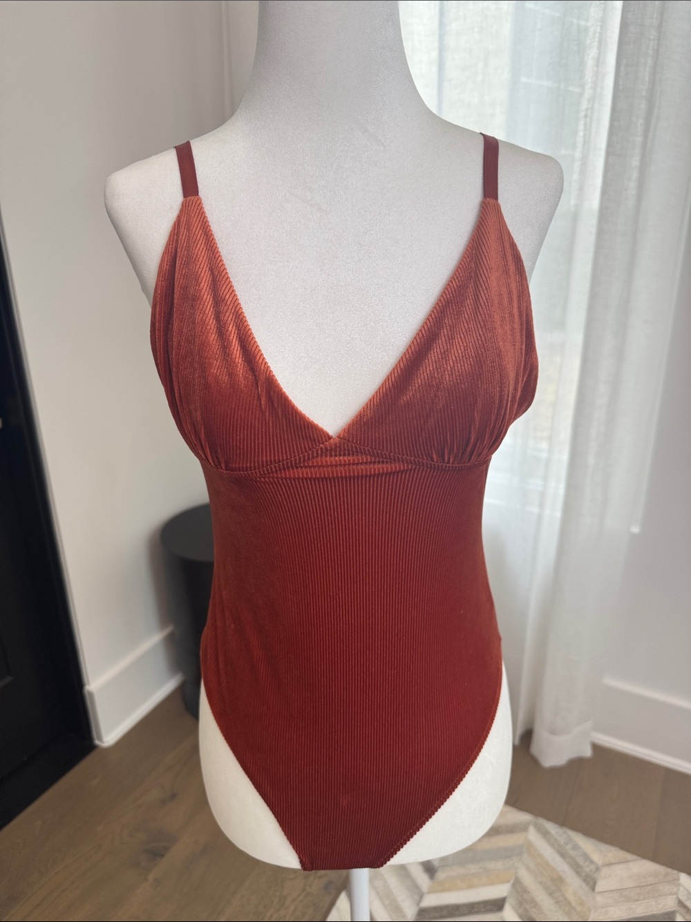 Rust Red colored Ribbed V-Neck Bodysuit